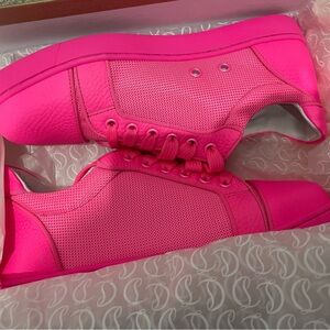 Christian Louboutin brand new  pink sneakers in perfect condition. Never worn.
